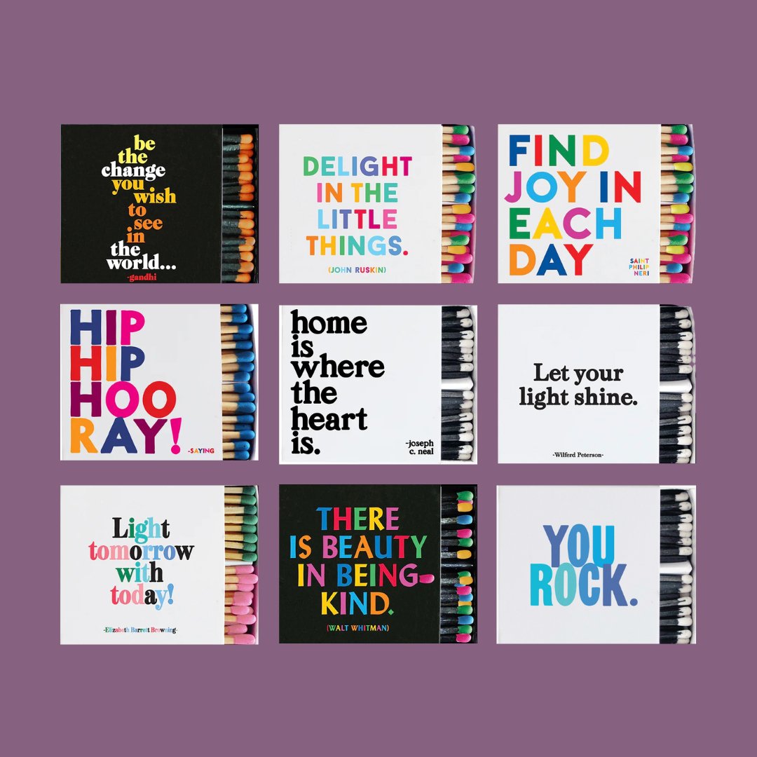 Nine colorful match books with encouraging quotes aligned in a 3 by 3 pattern.